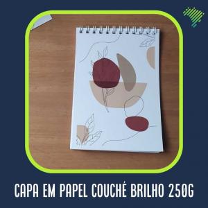 BLOCO DE NOTAS A6 Encadernado c/ Capa: Couché | 25 FLS Encadernado Espiral (Padrão). A6 10,5x14,8cm. Miolo Branco s/ Impressão (Padrão) | 25 Folhas (50pgs). Capa em Papel Couché Brilho 250g com Personalização Colorida só Frente. Embalagem Individual. 