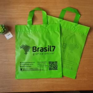 Sacola Plástica Várias Cores Alça Fita 26x36cm Polietileno PEAD 0,13 mm 26x36cm Impressão Monocromática só 1 Lado  Alça Fita Várias Cores
